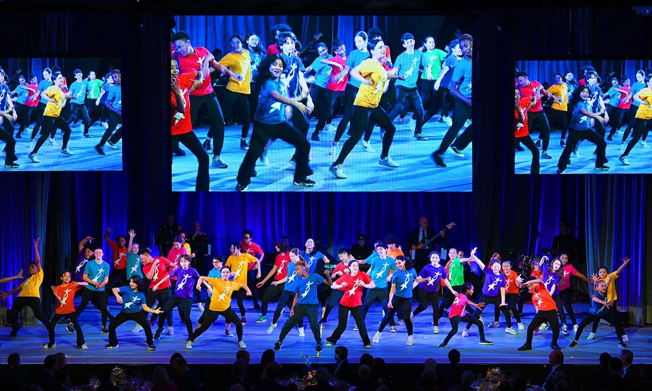 NDI Gala with NDI Children on stage performing